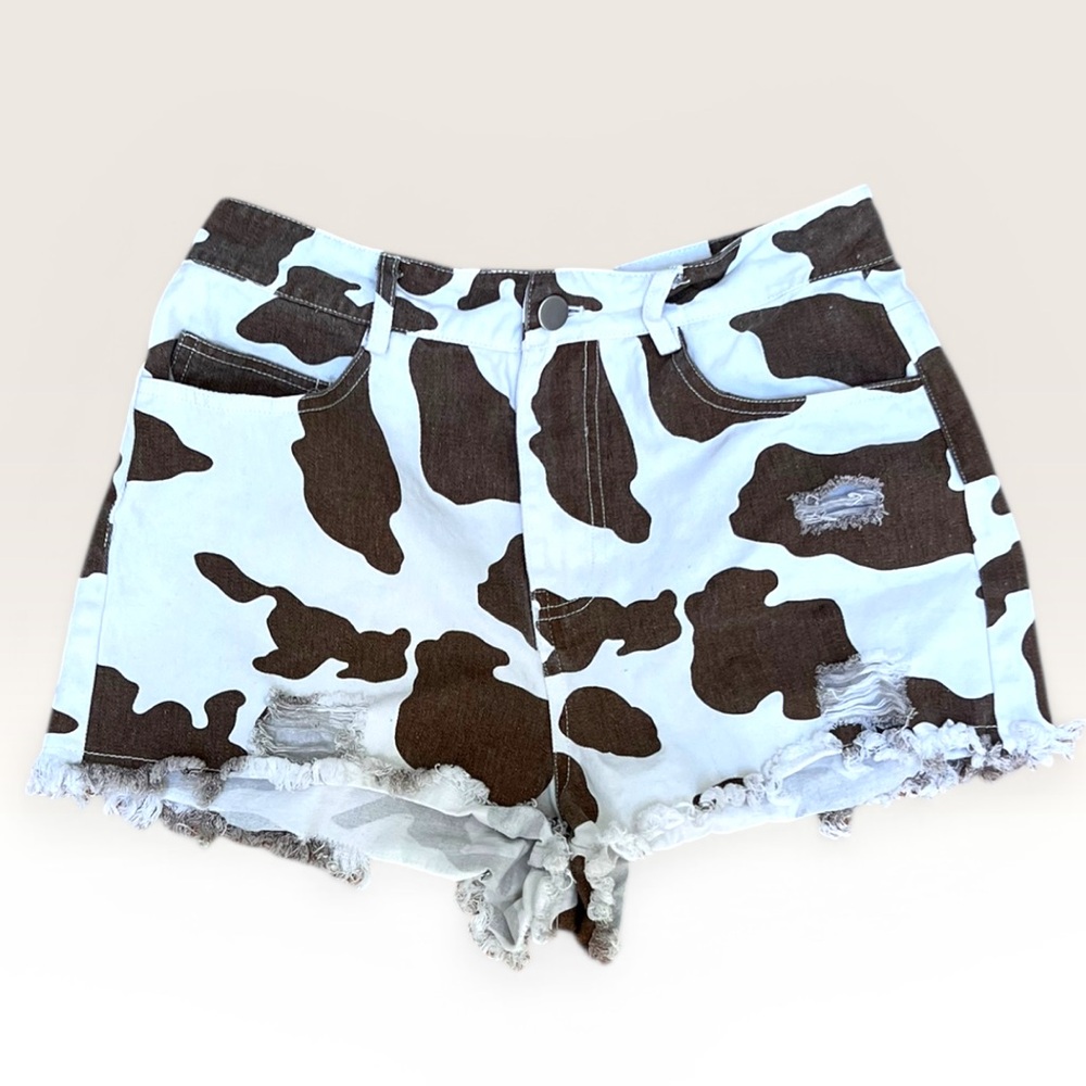 Brown & White Cow Print Distressed Denim Shorts